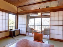 陽気館